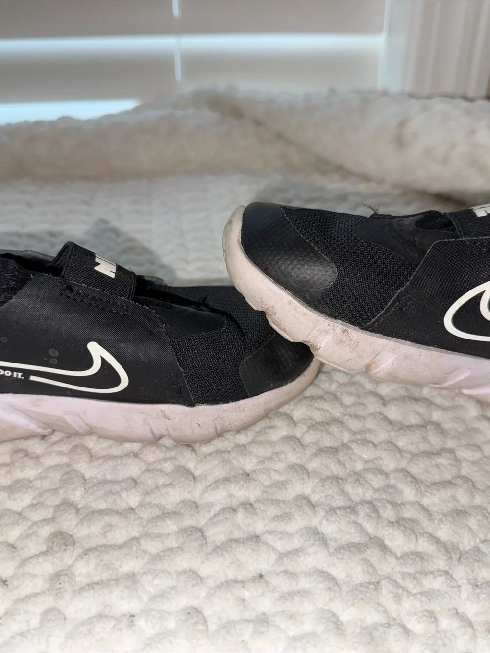 Nike Kids Black and White Slip-On Sneakers